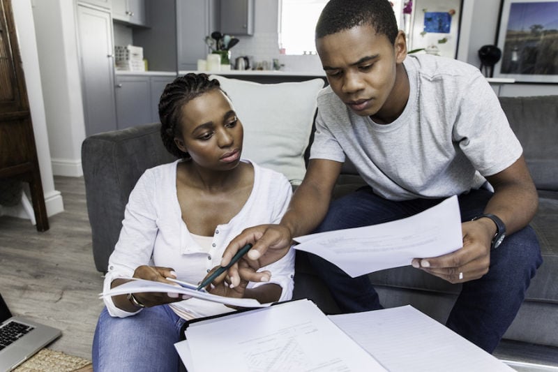 Couple Looking over Papers